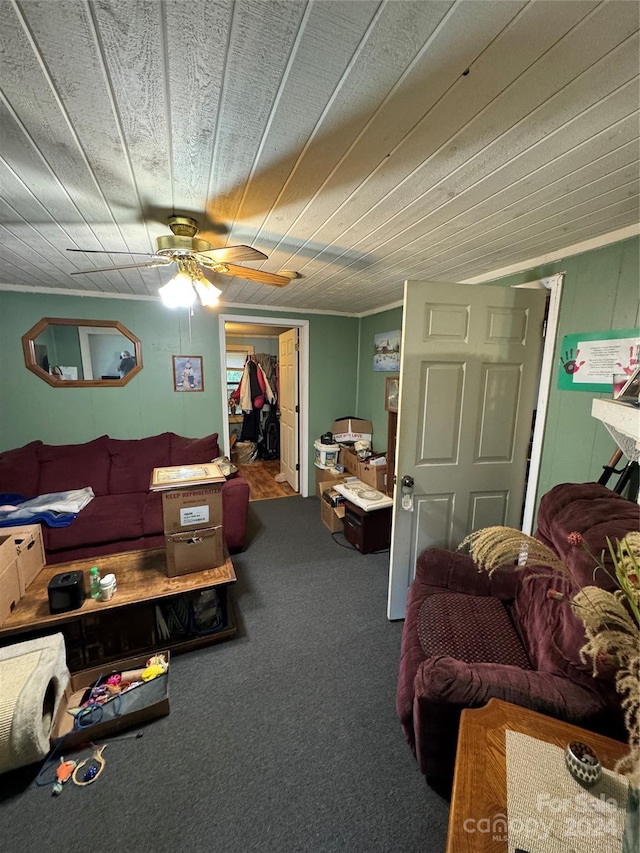 carpeted living room with ceiling fan