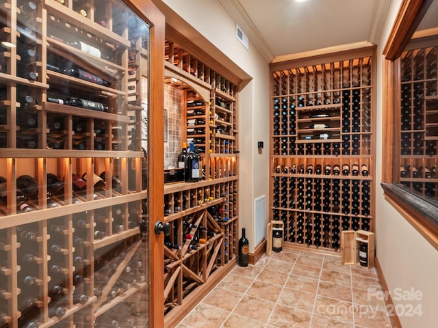 29 Elkton Dr, Pinehurst, NC 28374 - wine room with ornamental molding and tile floors