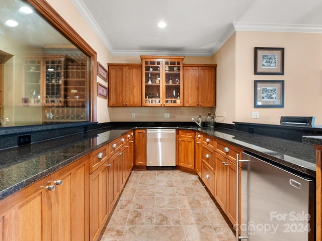 29 Elkton Dr, Pinehurst, NC 28374 - kitchen featuring ornamental molding, dark stone counters, stainless steel dishwasher, and light tile flooring