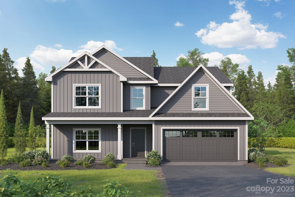 craftsman-style house featuring a garage