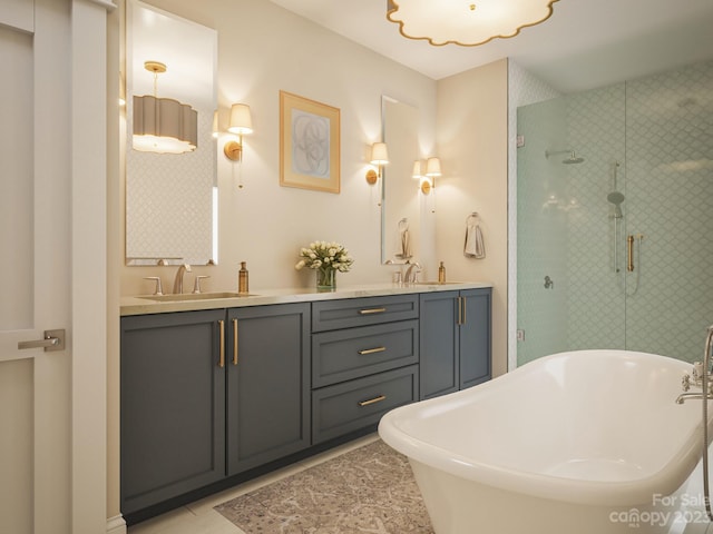 bathroom featuring dual vanity, tile flooring, and independent shower and bath