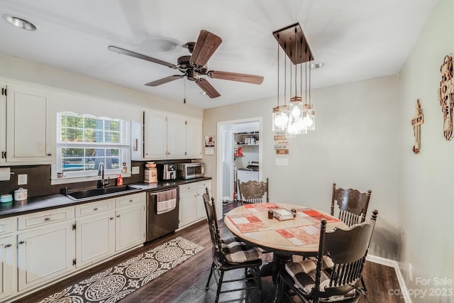 kitchen with white cabinetry, stainless steel dishwasher, sink, ceiling fan, and hanging light fixtures