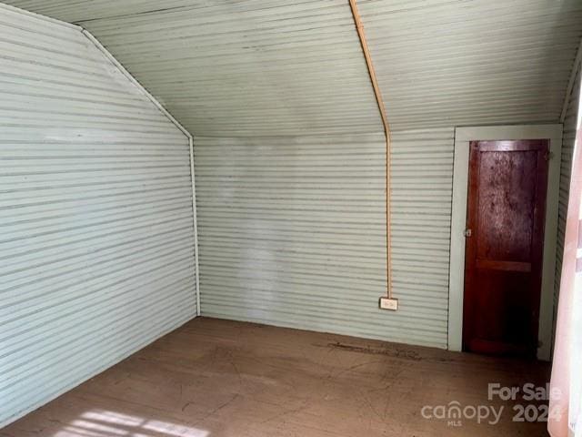 bonus room featuring vaulted ceiling