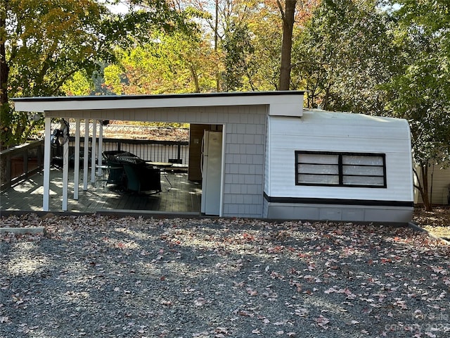 exterior space with a carport