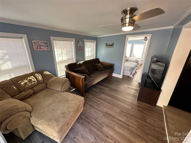 living room with ceiling fan, ornamental molding, and dark hardwood / wood-style flooring