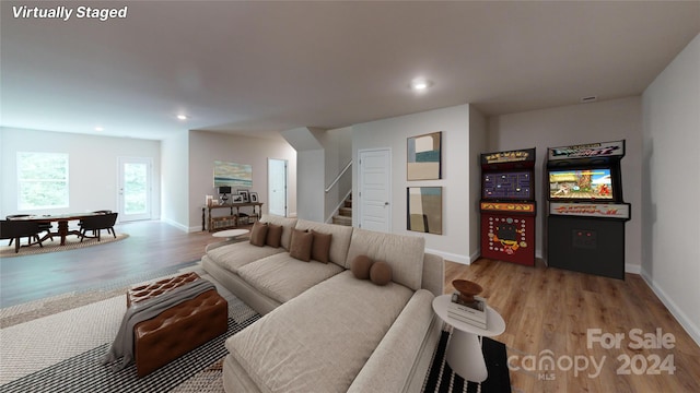 living room with light hardwood / wood-style flooring