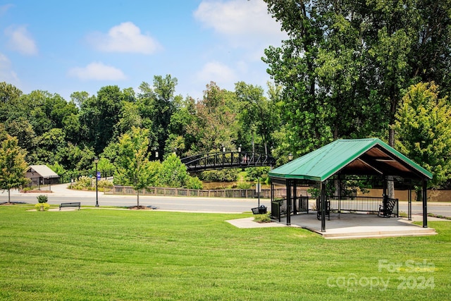 view of home's community featuring a gazebo and a lawn