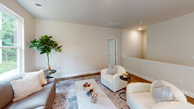 living area with light hardwood / wood-style floors