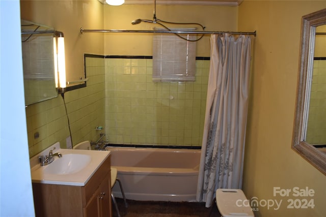 full bathroom featuring shower / bath combination with curtain, oversized vanity, and toilet