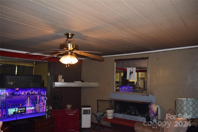 interior space featuring ceiling fan