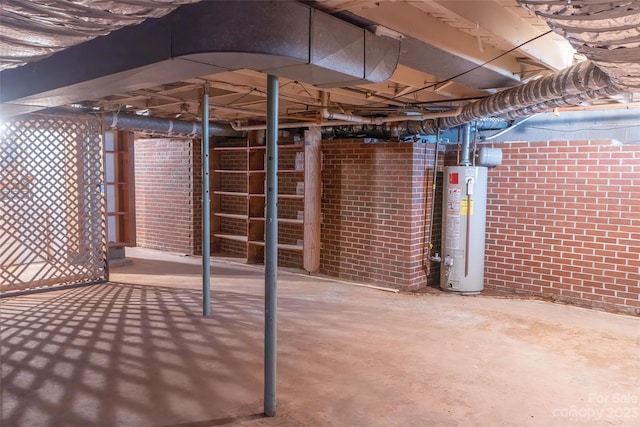 3616 County Home Rd, Conover, NC 28613 - unfinished basement with water heater and brick wall