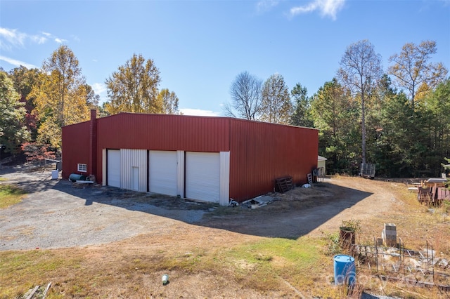 view of outdoor structure with a garage