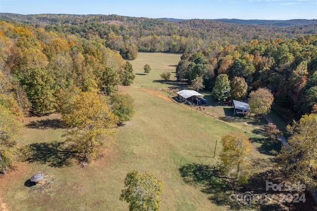 birds eye view of property featuring a rural view