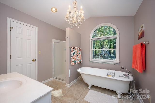 bathroom with independent shower and bath, vaulted ceiling, vanity, a notable chandelier, and tile floors