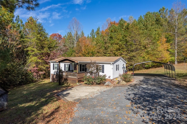 view of front of home featuring a wooden deck