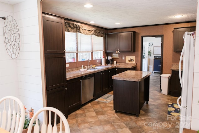 kitchen with dark brown cabinetry, a center island, light tile flooring, stainless steel dishwasher, and white refrigerator