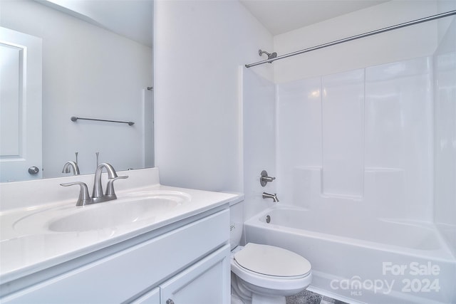 full bathroom with vanity, shower / bath combination, and toilet