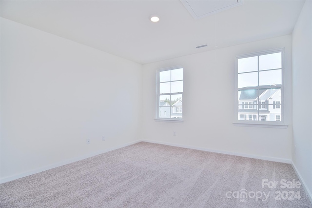 unfurnished room featuring carpet floors