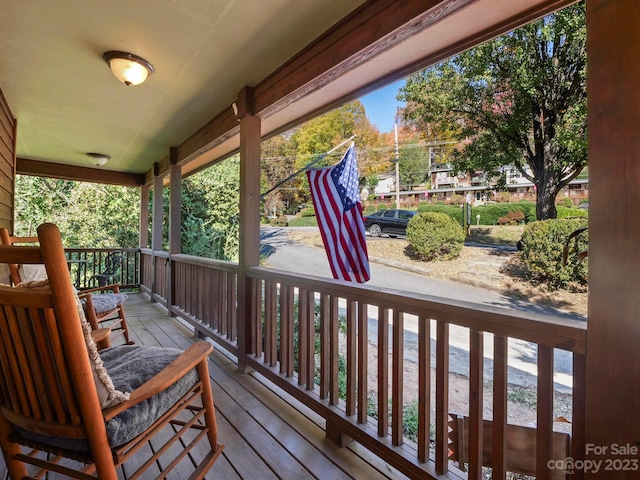 wooden deck featuring a porch