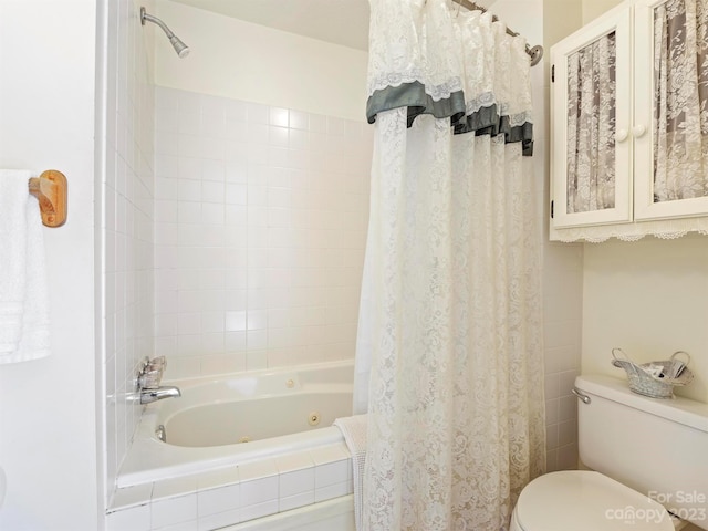 bathroom with toilet and shower / tub combo