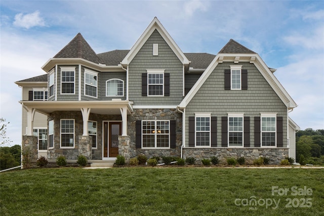 843 Lake Forest Drive Devonshire, Belmont, NC 28012 - view of front facade with stone siding, a front lawn, and a shingled roof