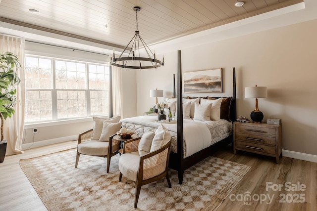 843 Lake Forest Drive Devonshire, Belmont, NC 28012 - bedroom with a chandelier, a raised ceiling, wood finished floors, and wooden ceiling