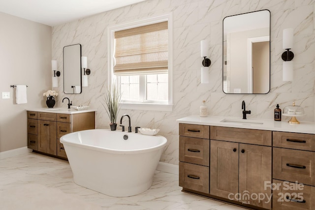 843 Lake Forest Drive Devonshire, Belmont, NC 28012 - full bathroom with marble finish floors, two vanities, a freestanding tub, and tile walls