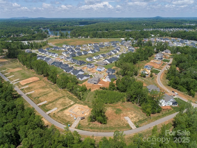 843 Lake Forest Drive Devonshire, Belmont, NC 28012 - aerial view of property's location with a heavily wooded area and nearby suburban area