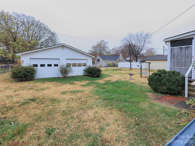 view of yard with a garage