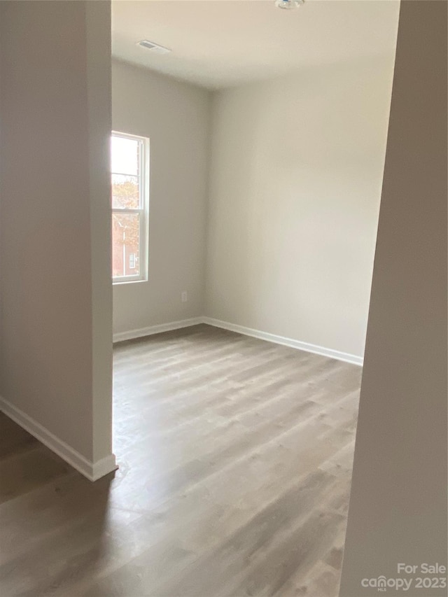 empty room with light wood-type flooring