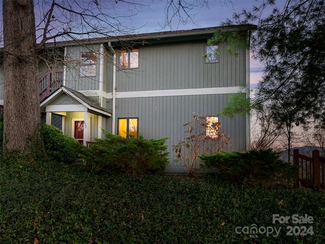 view of property exterior at dusk