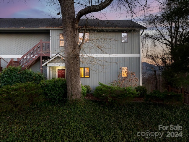 view of property exterior at dusk