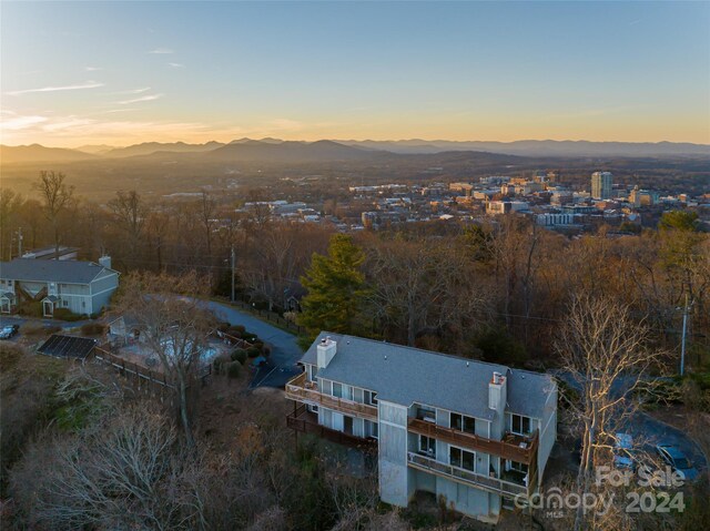 aerial view at dusk with a mountain view