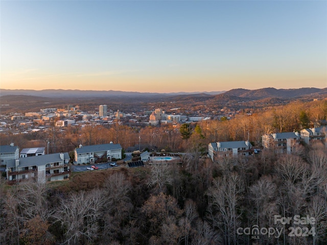 aerial view at dusk with a mountain view