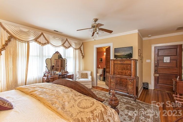 bedroom with ceiling fan, connected bathroom, hardwood / wood-style flooring, and crown molding