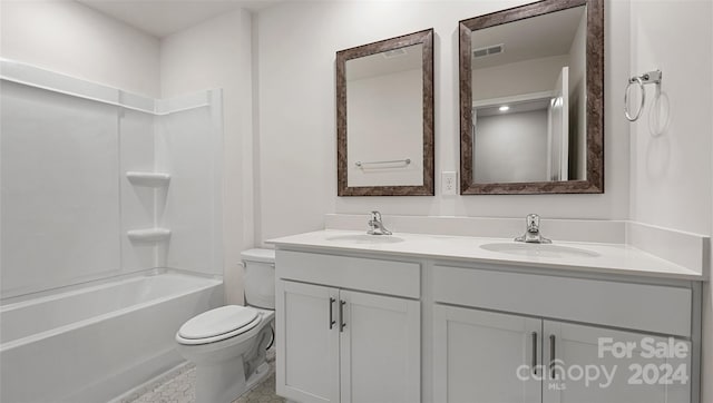 full bathroom featuring tile flooring, double vanity, bathtub / shower combination, and toilet