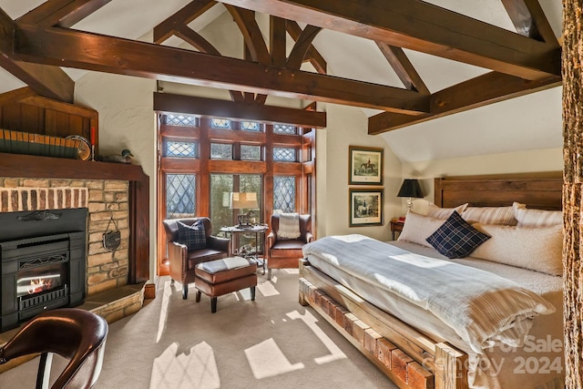 bedroom featuring high vaulted ceiling and beamed ceiling