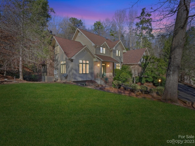 front facade with a lawn