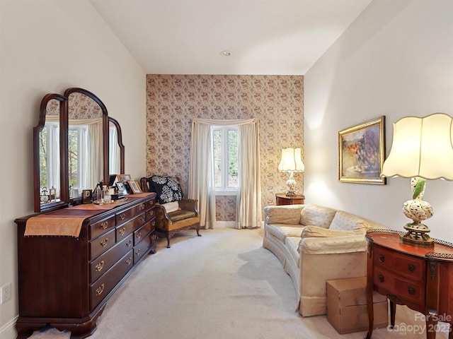 sitting room with light colored carpet