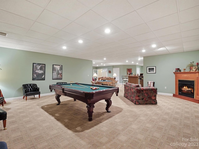 recreation room with light carpet, billiards, and a drop ceiling