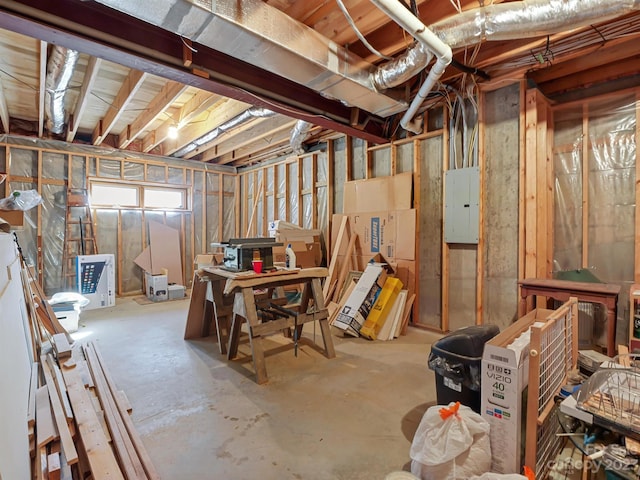 basement featuring electric panel