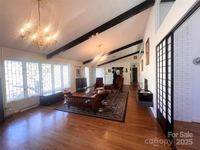 living area with vaulted ceiling with beams, a baseboard radiator, dark wood finished floors, and an inviting chandelier