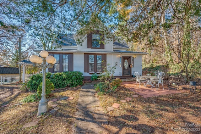 view of front of home with a patio area