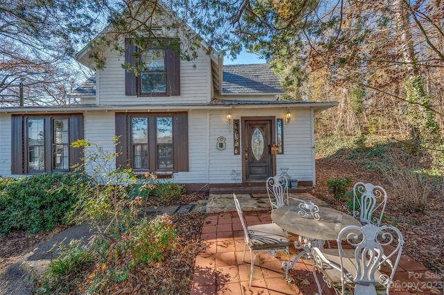 view of front of property featuring a patio area