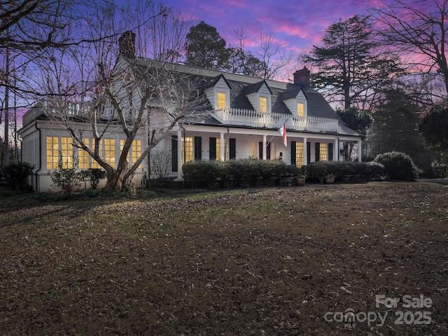 429 S Ridgecrest Ave, Rutherfordton, NC 28139 - cape cod home featuring a chimney and a balcony