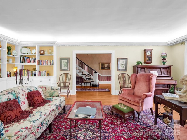 429 S Ridgecrest Ave, Rutherfordton, NC 28139 - living room with wood finished floors, baseboards, and stairway