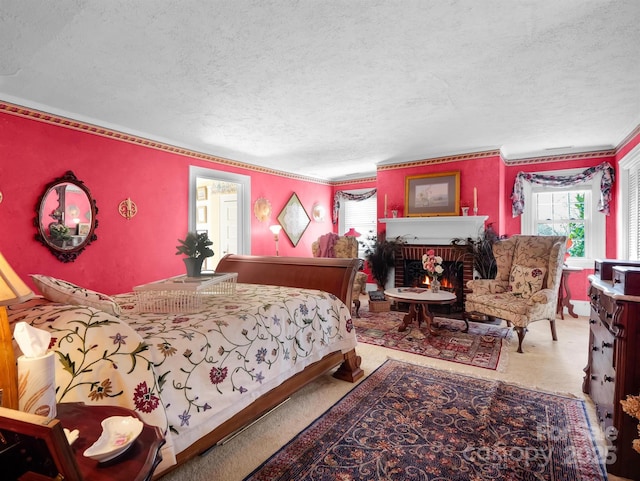 429 S Ridgecrest Ave, Rutherfordton, NC 28139 - carpeted bedroom featuring a brick fireplace, a textured ceiling, and multiple windows