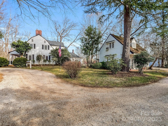 429 S Ridgecrest Ave, Rutherfordton, NC 28139 - view of side of home with dirt driveway and a chimney