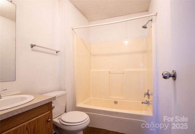 full bathroom with vanity, shower / bathing tub combination, a textured ceiling, and toilet