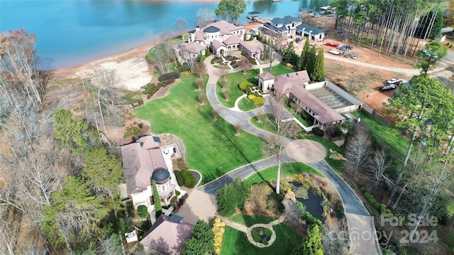 birds eye view of property featuring a water view